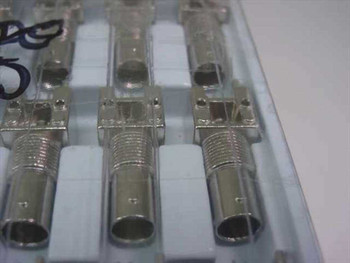 Sony 1-561-072-00 BNC plug housings — close-up front view showing barrel and body detail of multiple connectors
