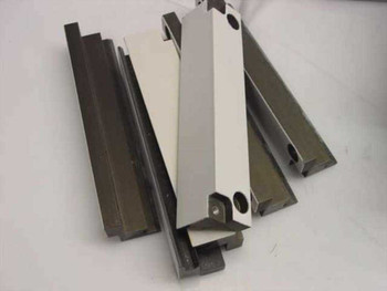MEC Tech AMAT guide rail components — multiple anodized aluminum extrusion rails and a white bracket piece