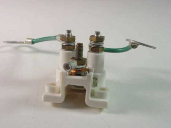 AT&T 62A/U Telephone Station Protector – side and bottom view showing DIN-style mounting base and screw terminals with grounding wire