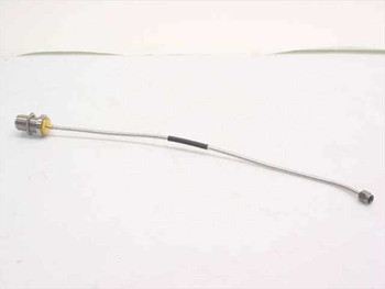 Semi-rigid coaxial cable approximately 11 inches long with N-Female bulkhead connector at left end and SMA-Male connector at right end – full length side view