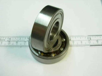 6204 6204Z steel ball bearing 20x47x14mm — angled view showing shielded and open sides stacked, ruler visible in background