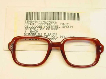 USS 6540-01-146-4276 military spectacle front, brown cellulose acetate frame, front view with NSN label showing Rochester Optical Mfg. Co. and contract SP0200-94-M-EF09