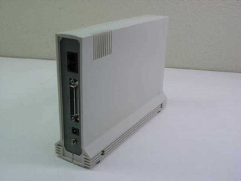 Calcom Products 1442-Ex external modem – left-side view showing DB-25 RS-232C port and power jack on rear panel