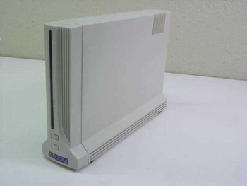 Calcom Products 1442-Ex external modem – right-side and front view showing yellowed beige enclosure with vented top