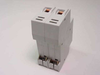 Entrelec GMB 20L circuit breaker rear view showing DIN rail mounting clip and dual copper terminal connections