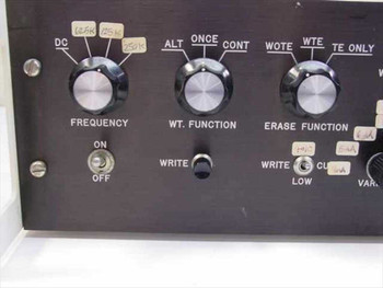 Dymek 852-1 front panel close-up – frequency selector (DC/125K/250K), WT function knob (ALT/ONCE/CONT), erase function knob, ON/OFF toggle, and WRITE toggle
