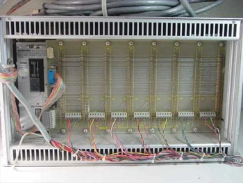 Scientific Atlanta 7325 decoder rack – rear internal view showing backplane, wiring harness, fuse block, and DC power connector