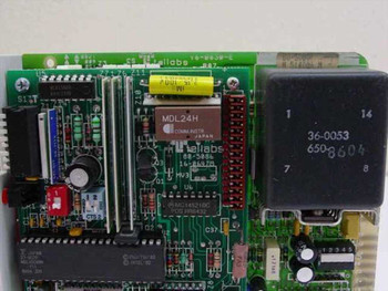 Tellabs 816123 PCB interior — top view showing MDL24H relay, Tellabs 88-5886 IC, PLMC14521BG IC, and component layout