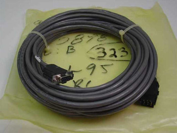 FSI 908152-050 Rev B Polaris cable full length coiled view with handwritten inventory labels on green tissue paper