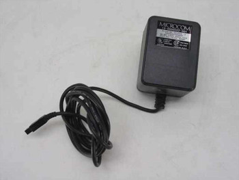 Microcom 13-0000022-001 19.5V plug-in transformer power supply with attached 6-pin cable coiled, front/side view