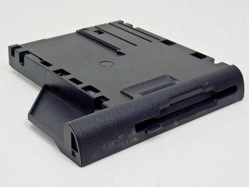 Dell 09YXE floppy disk drive module – top/front angled view showing drive slot and plastic bay housing