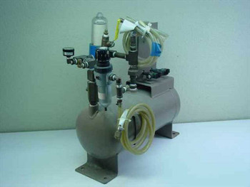 Brunner Engineering Air Station Tank rear/side view showing pneumatic fittings, tubing connections, water separator bowl, and yellow air hose