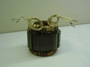 Motor Stator EDM85469 front view showing laminated core and lead wires extending from top