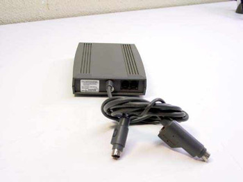 Supra SupraExpress 33.6 modem — rear view showing serial cable, power connector, and regulatory label
