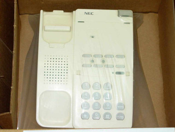NEC ETJ1HM1 white desktop telephone close-up showing NEC logo, speaker grille, 12-key dial pad, and FLASH key