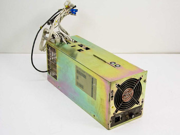 NCR 530-0009297-1 mainframe power supply – front-left three-quarter view showing iridescent zinc-plated steel chassis and output wire harness
