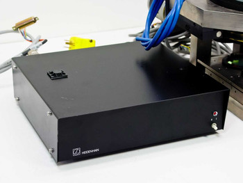 Heidenhain EXE 702B black enclosure interface unit front and top view showing Heidenhain logo and indicator LEDs