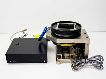 Heidenhain EXE 702B encoder interface unit beside custom 195mm rotary stage positioner with ROD 456-900 encoder — full system overview