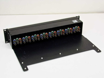 ADC CV-8-N patch bay rear view showing rows of color-coded BNC coaxial connectors (blue, red, green, orange) on the rear panel