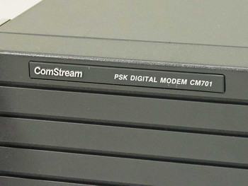 ComStream PSK Digital Modem CM701 — close-up of front panel nameplate label