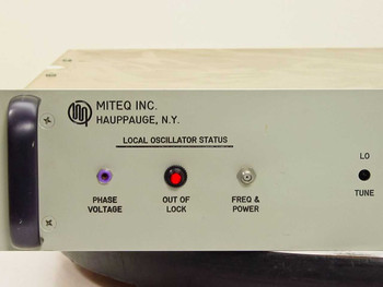 Miteq DN8000/10268 Downconverter – front panel close-up showing MITEQ INC. Hauppauge N.Y. logo and Local Oscillator Status panel with Phase Voltage, Out of Lock, and Freq & Power indicators