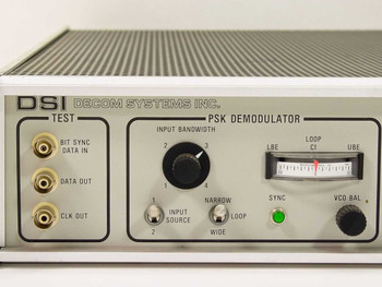 Decom Systems DSI 7376 PSK Demodulator section – close-up of front panel showing BNC test connectors, input bandwidth knob, input source switch, loop/wide switch, sync LED, and loop meter