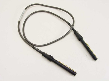 Dynatech Communications DPC-12-3 4-foot 12-pin video patch cable — full cable view showing both proprietary spring-contact connectors and dark gray cable