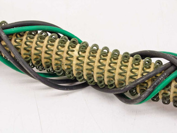 Titan Industrial 4-113-G heating element – close-up of spiral coil structure showing tan and green coil windings with black and green leads