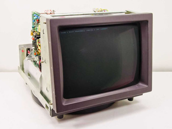 Aydin Controls 5219 19-inch rackmount CRT terminal – three-quarter front view showing screen powered on with boot message and exposed internal electronics on left side