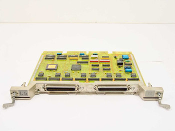 DEC M3119-YA CXY08-M 8-line async serial communication card – angled top view showing PCB and dual DB connectors on front bracket