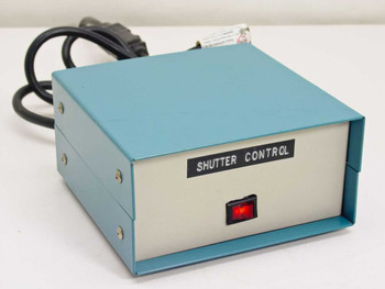 Electronic Shutter Controller front panel with SHUTTER CONTROL label and illuminated red rocker switch, teal metal enclosure