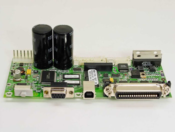 Zebra 402420-001 printer motherboard front view showing DB25 parallel port, DB9 serial port, USB port, and two large electrolytic capacitors