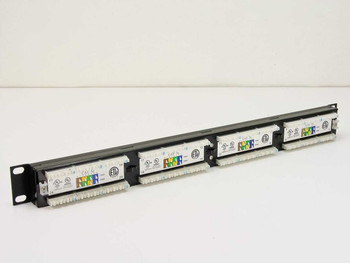 Dynacom CAT 5e 24-port patch panel – rear view showing four punchdown blocks with color-coded T568A/T568B wiring guides and ETL certification labels