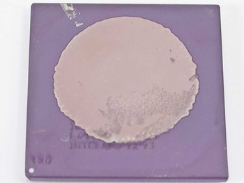 Intel SL22M Pentium 120MHz Socket 7 CPU — bottom (contact/lid) side showing purple ceramic substrate and partial label