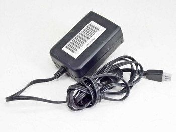 HP 0950-4404 printer power adapter — top angled view showing barcode label and output cable with proprietary connector