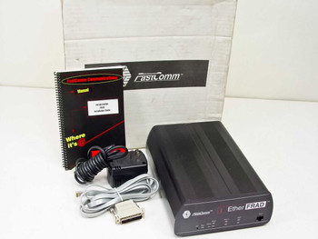 Fastcomm F9200-SS-FNE1-A1000 EtherFRAD open-box contents — unit, manual, power adapter, cable, and adapters with original Fastcomm box