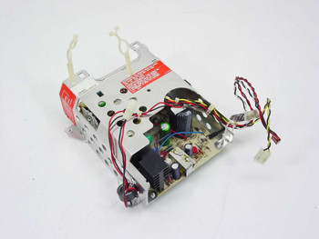 Radius 915-0100R vintage Mac power supply — side-angled view showing PCB, green indicator LED, and wire harness routing