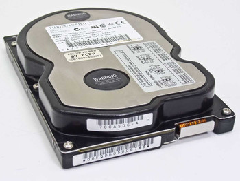 Fujitsu MPD3130AT 12.9GB 3.5-inch IDE hard drive — top label view showing part number CA05177-B91600AW and barcode