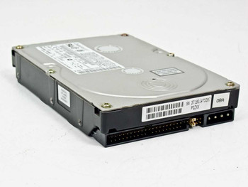 Quantum Fireball EX 8.4AT — left-side angled view showing IDE and power connectors at rear with serial number barcode label