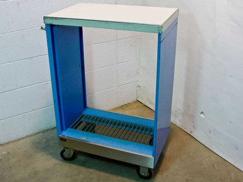 Wright Line blue rolling work cart — front-right three-quarter view showing open cavity, bottom grate shelf, and swivel casters