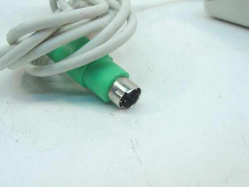 Microsoft IntelliMouse X04-72167 — close-up of green 6-pin Mini-DIN PS/2 connector