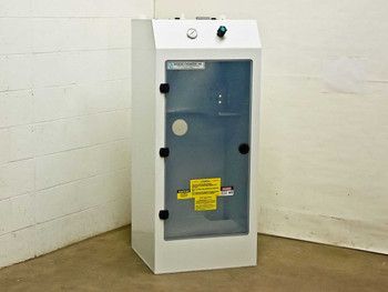 Systems Chemistry Inc. Chemical Tank Delivery System Enclosure – front three-quarter view showing clear door and top-mounted pressure gauge