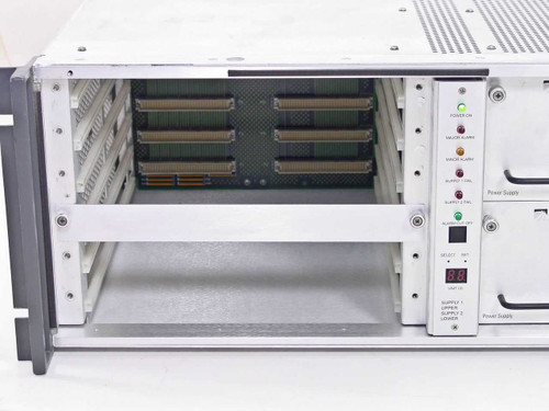 Scientific Atlanta D-9130 chassis front angled view showing plug-in card slots and PSU control panel with indicators