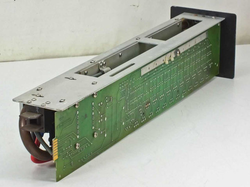 Spectra-Physics 2210 laser power supply module — bottom/PCB side view showing green circuit board and toroidal transformer