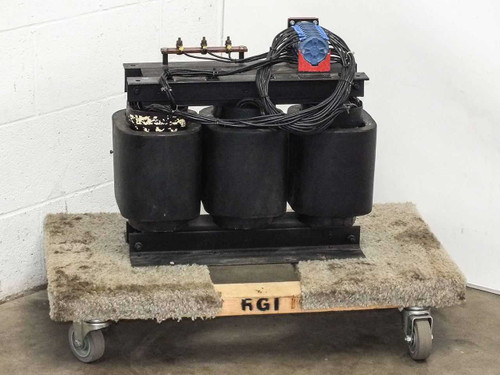 Varian MED 01-000062-00H 12kVA three-phase transformer — front-right view showing three-phase coil assembly, top-mounted tap switch, and full wiring harness loop
