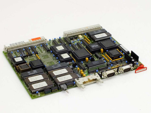 Netstal CUC 110.240.9468 system board — angled top view showing dual DB9 serial ports, large ICs, and ribbon-cable connectors on rear edge