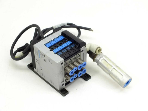 Festo CPV-10-VI0782 valve terminal controller front-left view showing 4 blue micro valve sub-bases and push-in pneumatic fittings with inline filter assembly attached