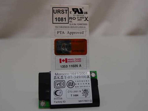 Toshiba K000833900 modem PCB reverse side showing URST 1081, Industry Canada 1353 11026 A, and Morocco approval labels with component side of board