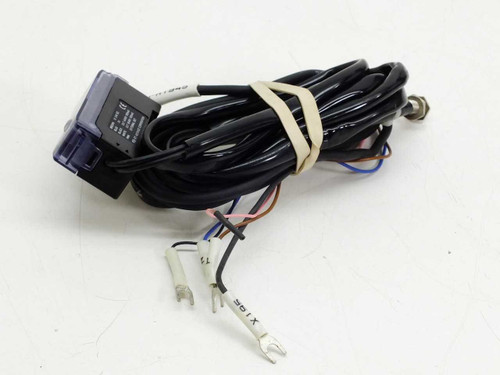 Keyence FS-V1 Fiber Optic Sensor Amplifier side view showing cable bundle and mounting hardware
