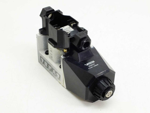 Tokimec 02-123806 D7-24 DC 24V hydraulic solenoid valve — front-left three-quarter view showing solenoid coil housing and valve body